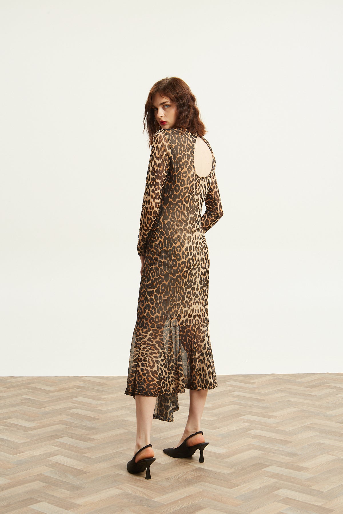 Victoria turtleneck mesh leopard dress