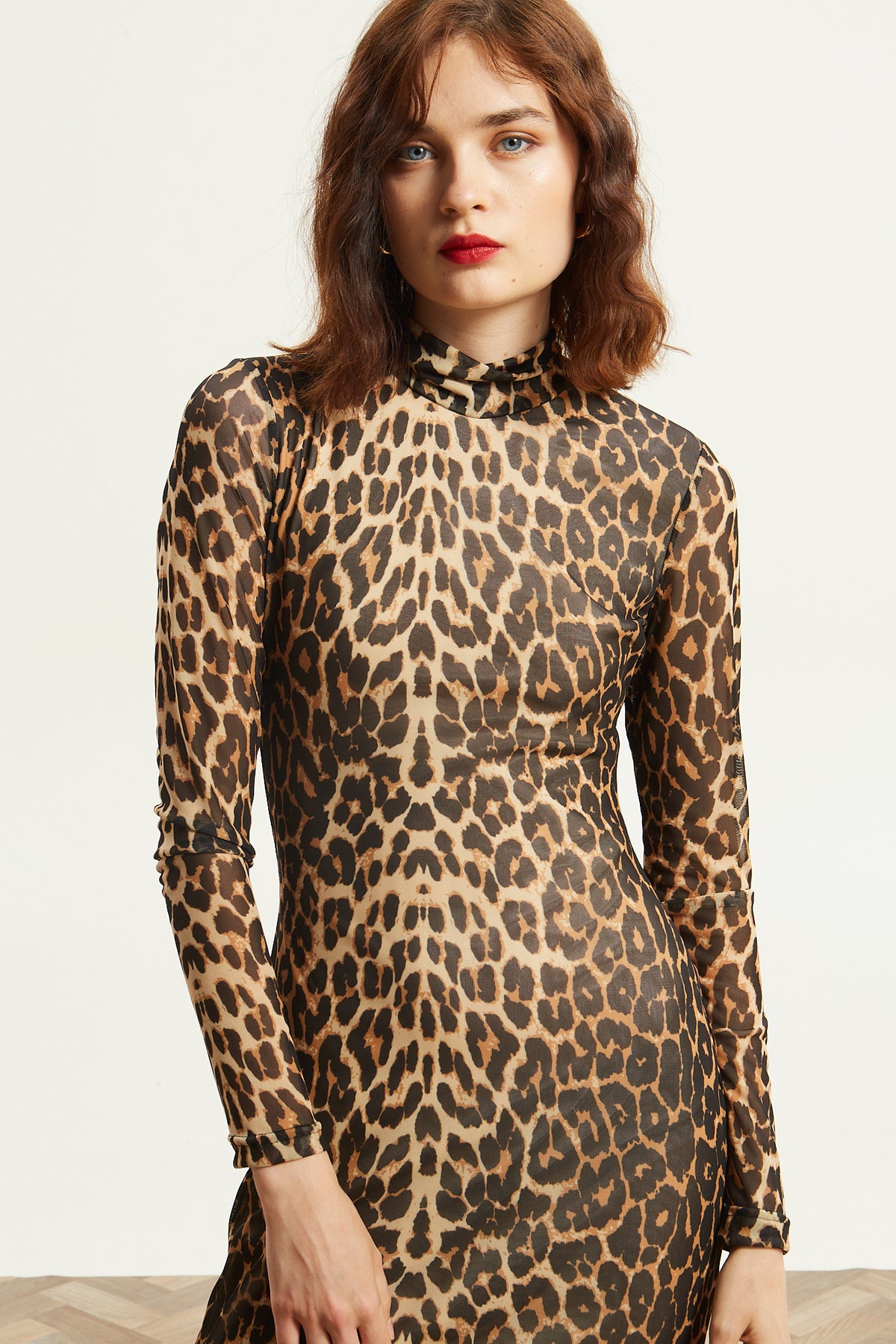 Victoria turtleneck mesh leopard dress